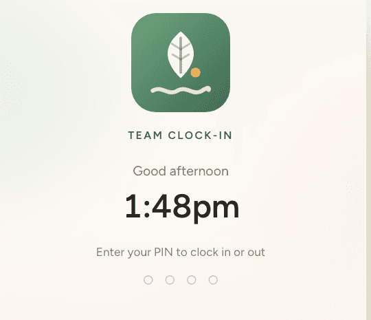 The clock-in kiosk in a venue’s own colours, showing its logo above “Team clock-in”